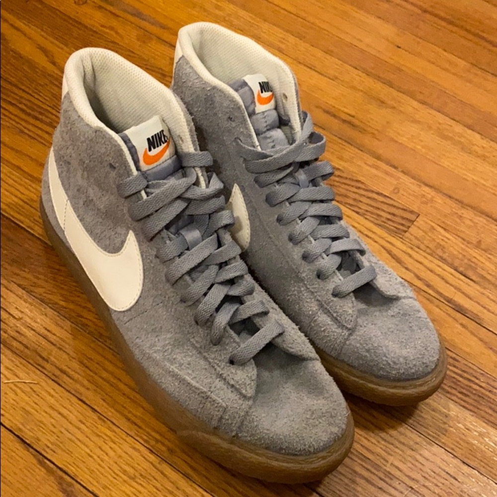 Ice blue suede Nike high top sneakers